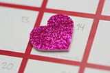 Close up of pink glittery heart marking valentines day
