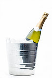 Bottle of champagne chilling in ice bucket