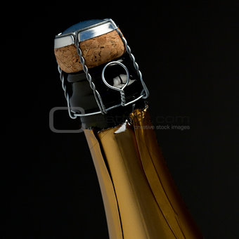 Zoom on top of champagne bottle