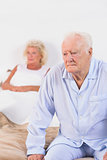 Elderly couple on a bed