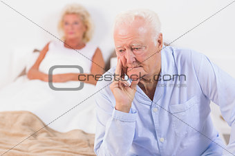 Discouraged old couple