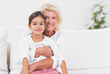 Smiling granddaughter and grandmother portrait