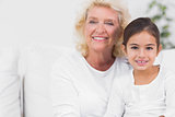 Cheerful granddaughter and grandmother portrait