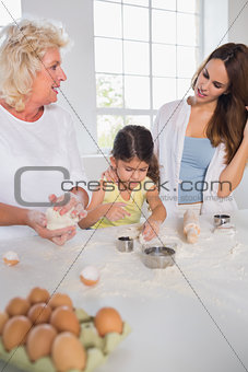 Women of a family baking together