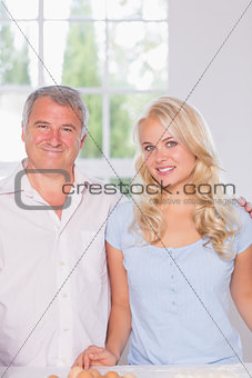 Portrait of a father and adult daughter