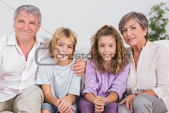 Portrait of children and their grandparents