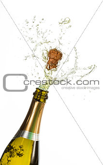 Bottle of champagne popping