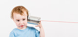 child with tin can phone