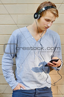 Young male going through song list