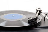 Spinning vinyl record. Motion blur image.  Vintage toned. 