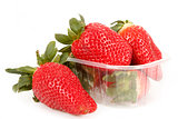 fresh strawberries in box on white
