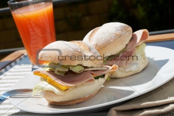 Ham and cheese sandwich and juice