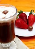Cup of coffee with strawberries 