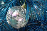 Transparent christmas ball on tree
