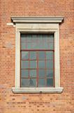 Old window in brick wall