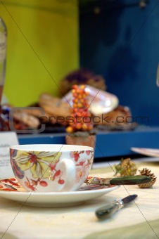 Flower pattern cup on table