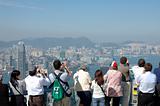Tourists sightseeing the Hong Kong skyline