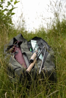 fishing rods in grass