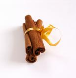 Cinnamon - three sticks on white