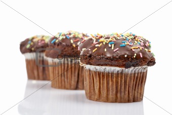 Three tasty muffin with chocolate
