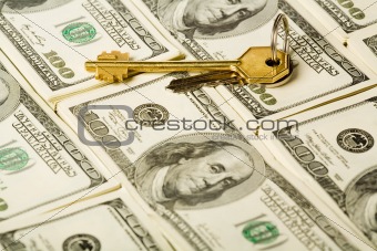 Gold key and money