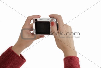 Hands holding camera