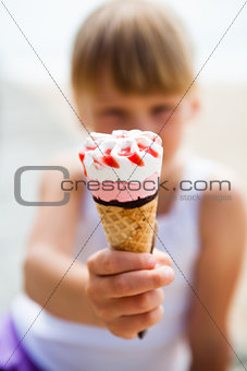 Ice cream held by young girl
