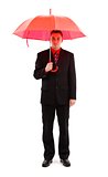 Businessman with red umbrella