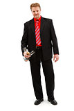 Man holding champagne and glasses