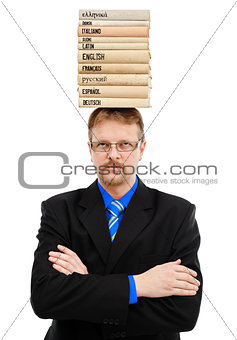 Man with language books on head