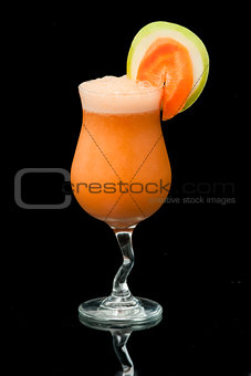 cocktail with carrot and apple on the black
