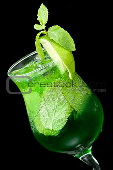 cocktail with lime and mint closeup