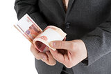 stack banknotes of 5000 rubles in male hands