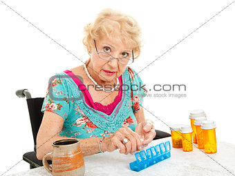 Senior Woman Sorting Pills