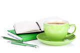 Coffee cup and office supplies