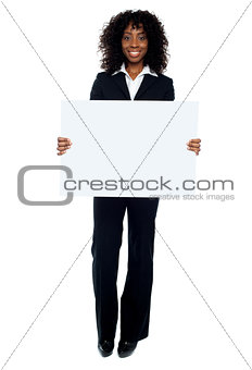 Business lady promoting big blank banner ad