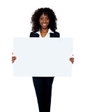 African woman showing billboard banner