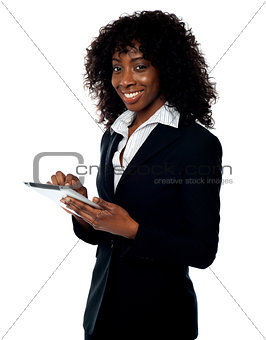 Cheerful business woman using tablet pc