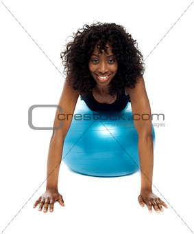 Fit african woman exercising