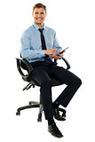 Corporate man working on touch pad device