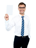 Corporate male holding blank white card