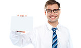 Handsome male showing blank business card