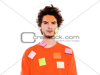 one young man portrait covered by  adhesive notes
