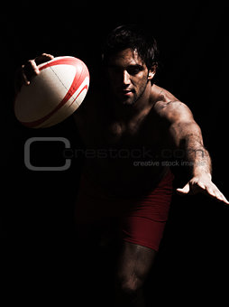 sexy topless rugby man scoring touchdown