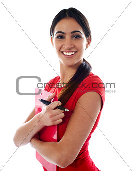 Smiling modern girl holding clipboard