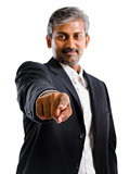 Asian Indian business man finger pointing at you