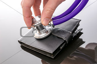 Checking a wallet with a stethoscope