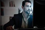Suprised Man Looking At A Computer Monitor