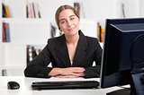 Businesswoman At Office Desk