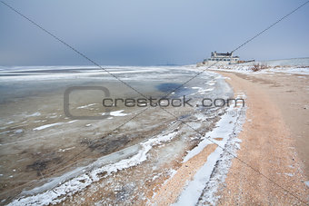 frozen sand beach in winter